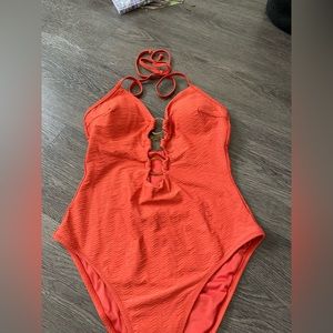 NWT Orange one piece with front rings